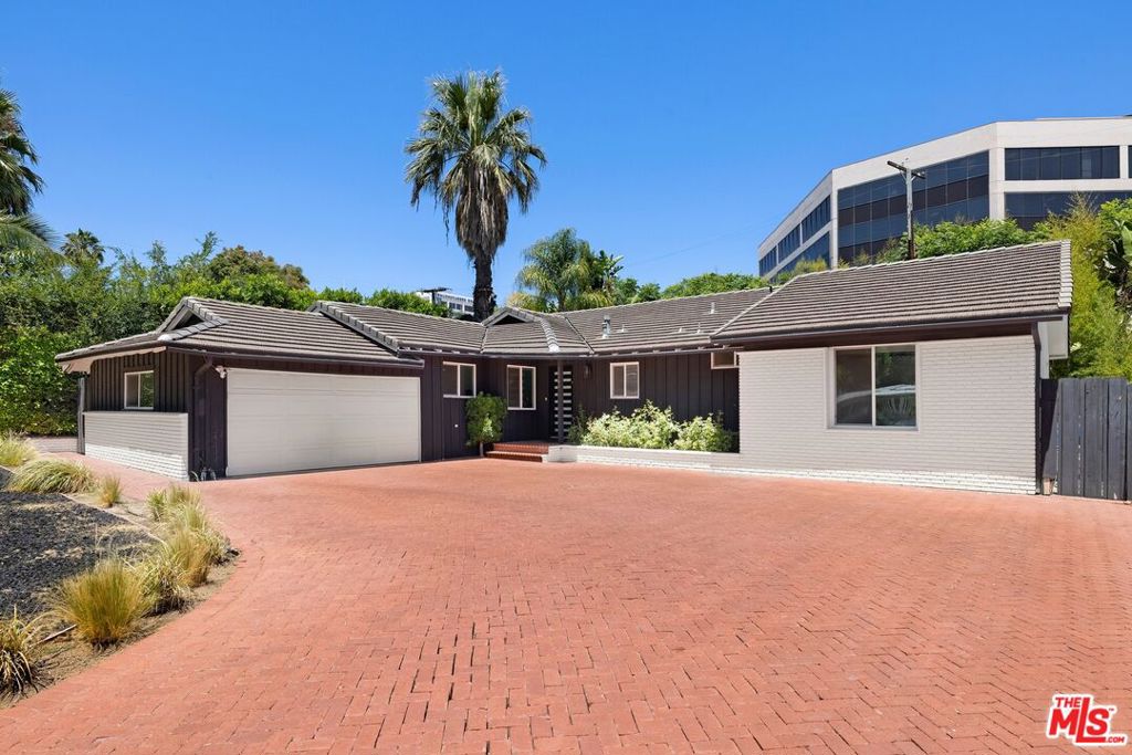 Welcome to a beautifully updated 3-bedroom, 2.5-bath home nestled in one of Encino's most desirable neighborhoods. Offering 1,832 square feet of modern living, this turnkey lease blends contemporary comfort with relaxed California style. The thoughtfully designed open floor plan connects the main living space, kitchen, and dining area, creating a seamless flow perfect for both everyday living and entertaining. Oversized windows flood the home with natural light, enhancing its warm, inviting ambiance. Step outside to your private backyard retreat complete with a sparkling pool, BBQ, and cozy fire pit ideal for year-round outdoor enjoyment. This fully furnished lease includes tasteful, high-quality furniture and essential household items, allowing for a truly effortless move-in experience. An EV charger is also installed for added convenience. Located just south of Ventura Boulevard, enjoy quick access to top dining, shopping, parks, and great schools while still tucked away in a peaceful, private setting.