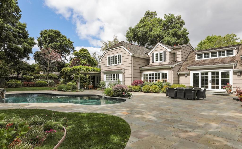 Enjoy impeccable styling, a prestigious Lindenwood address, and expansive indoor/outdoor enjoyment at this refined home on a corner lot of nearly one acre. Presenting classic and timeless style, this two-story home has been updated and remodeled throughout with the addition of a guest house, pool, and spa on the expansive rear grounds. Fine hardwood floors, French doors, and Carrara marble add elements of classic appeal. Every room is amply proportioned with grand formal venues, a dedicated office, fitness center or playroom, plus a tremendous kitchen and family room and even a basement wine cellar. There are 4 spacious bedrooms, including a main-level suite, plus a large guest house with full kitchen currently doubling as a recreation center and home theatre with cinema screen and projector. Total 7,316 SF = 5,875 SF Main Home + 546 SF Garage + 895 SF Guest House.