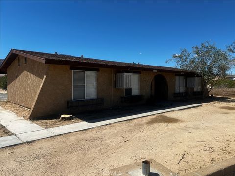 Photo of 73601 Sun Valley Drive, 29 Palms, CA 92277 (MLS # SW26072327)