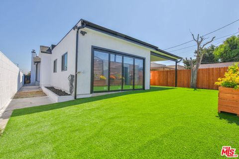 Photo of 7803 S Harvard Boulevard, Los Angeles, CA 90047 (MLS # 25620525)