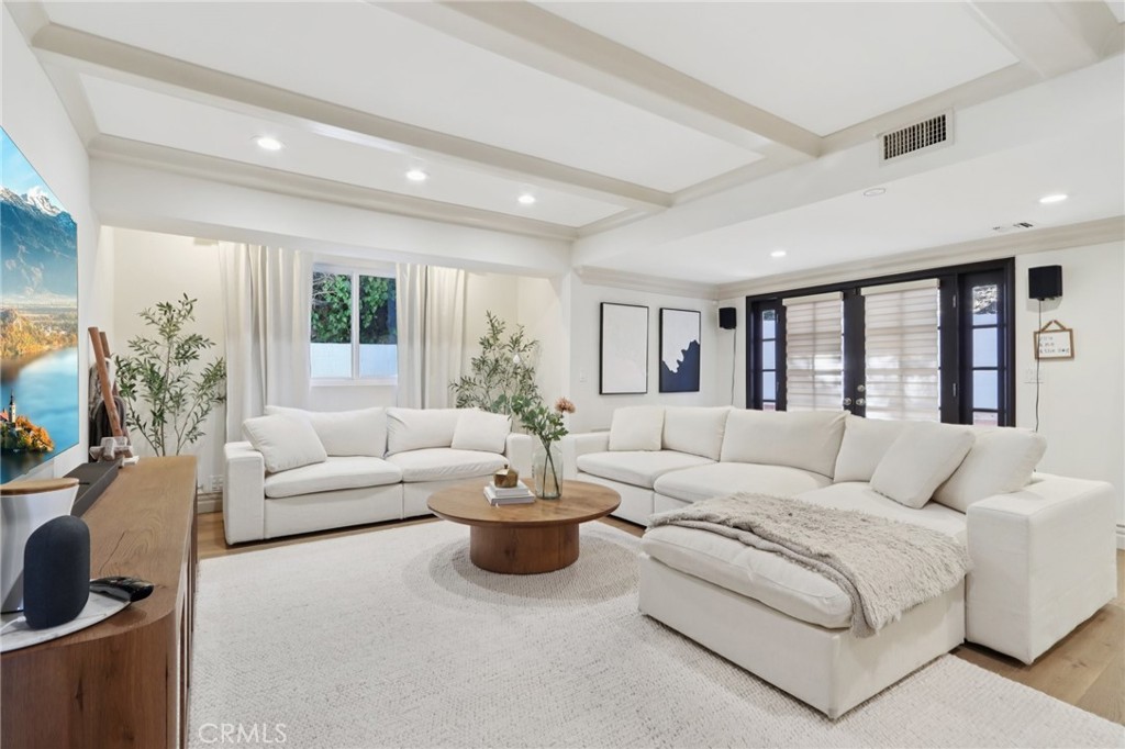 Best Deal in Town! Welcome to an exceptional residence that defines elegance and sophistication. Nestled in the hills south of Ventura Blvd, this stunning 3,159 sq ft estate boasts 3 spacious bedrooms and 3.5 bathrooms, offering an unparalleled living experience infused with timeless charm and modern refinement.
Soaring ceilings, New AC, rich architectural details, and refined finishes set the stage for grand living. The expansive formal living room, elegant great room, and sophisticated dining area are designed for both intimate gatherings and large-scale entertaining. Multiple fireplaces and three sets of French doors invite you to experience seamless indoor-outdoor flow to a series of expansive wraparound decks with commanding city vistas.
The chef’s kitchen is a masterpiece in both form and function—featuring an oversized stone island, bespoke cabinetry, and top-tier appliances, ideal for culinary excellence and entertaining in style.
The lavish primary suite is a private sanctuary, featuring a spacious walk-in closet, dual vanities, and a sprawling balcony with sweeping views of the city skyline. Outside, the entertainer’s dream continues with a resort-style pool and multiple sun-drenched decks encircling the estate—offering serene privacy and elevated luxury living.
This is more than a home—it’s a statement. A rare offering of comfort, grandeur, and architectural distinction in one of the Valley’s most prestigious locations.