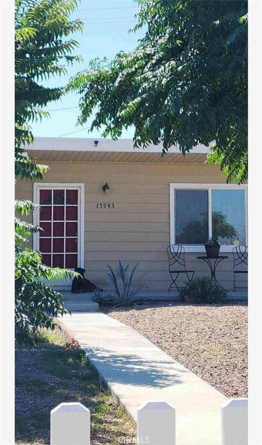 MOTIVATED SELLER. Beautiful well kept home that features 2 bedrooms and 1 full bath. Huge front and back yard with lots of storage and yard is prestige and full of plants that have been established.  House has a above ground swimming pool and Big detached 2 car garage with a long driveway.  Near all stores for convenience. Must see to appreciate. House is located close enough to travel to the mountains, beach or desert. House is freshly painted with bath and kitchen very well kept.  Separate 2 singles in the backyard and a bathroom. House has a beautiful white picket fence already on property.  This house is move in condition and comes with all the appliances, outside gardening tools, Solar system and security cameras.