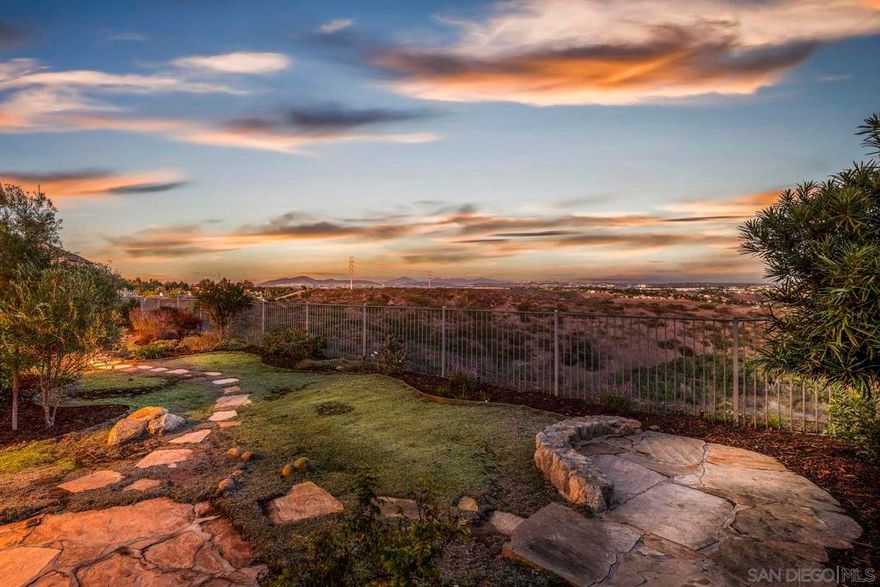 Spectacular panoramic canyon, mountain and evening light VIEWS set on an expansive 8,086 sq. ft. lot, this stunning residence offers unobstructed views from multiple decks, balconies, and thoughtfully designed outdoor living spaces. Situated at the end of the cul-de-sac.The meticulously landscaped yard provides the perfect backdrop for entertaining or simply relaxing and soaking in the scenery. Step inside to find a freshly updated interior — entirely painted in designer tones, including walls, ceilings, trim, and closets paired with brand-new carpet for a crisp, move-in-ready feel. Solid hardwood flooring. A formal entry with soaring ceilings introduces light-filled formal living and dining rooms, a convenient first-floor powder room, and a spacious office or flex space. The open-concept kitchen, breakfast area, and family room feature an oversized island, built-in desk, and custom media center. Solid cherrywood cabinetry, pull-out shelving, Bosch stainless steel appliances, and custom bookshelves enhance both style and function.  Upstairs, the seller added a versatile loft with a view window and balcony  ideal for a media room, playroom, or gym. The spacious primary suite retreat boasts its own private deck to capture the views, along with a spa-inspired bath offering dual vanities, a sit-down vanity, soaking tub, walk-in shower, and a generous walk-in closet. Three additional bedrooms include one en-suite, while the upstairs laundry room features built-ins and a sink. Additional upgrades include:2019 tankless water heater, Whole-house water filtration system, New exterior light fixtures (2025), Toto toilets in all baths, additional windows added throughout, updated light fixtures in baths, wood flooring, custom built-ins, TWO gas furnaces one for each floor & so much more. Located in the highly sought-after Torrey Hills community, within the Del Mar Union & San Dieguito School Districts, and just one mile from Torrey Hills Elementary. Enjoy nearby shopping, dining, and easy freeway access. This home perfectly blends panoramic views, thoughtful upgrades, and a prime location — don’t miss the seller’s detailed upgrade list!