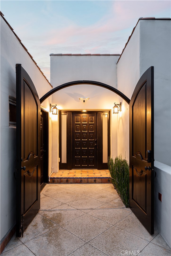 Discover coastal living at its finest in this beautifully updated 4-bedroom, 2-bathroom residence, perfectly situated in the heart of San Clemente, known fondly as the “Spanish Village by the Sea.” With its classic white stucco exterior and inviting Spanish-inspired architecture, this home radiates charm and character while offering modern updates designed for today’s lifestyle.
From the moment you arrive, you’ll feel the coastal ambiance that defines this special community. Located just a few blocks from the San Clemente Pier and only a short stroll to the lively downtown district, this home places you within easy reach of the beach, oceanfront walking trails, boutique shops, and the vibrant dining scene that has made San Clemente a true destination.
Inside, the home has been thoughtfully refreshed with a warm, timeless aesthetic that blends classic Spanish elements with contemporary style. The spacious floor plan offers comfortable living and entertaining areas, with natural light flowing throughout the interior.
The Primary Suite is a serene retreat you’ll look forward to at the end of each day. Designed with both comfort and luxury in mind, it features a spa-inspired bathroom with dual vanities, a soaking tub, and a separate walk-in shower. A cozy fireplace adds a calming touch, while dual sets of French doors open directly onto the back patio, extending your living space outdoors. It’s the perfect place to enjoy your morning coffee, unwind with a book, or entertain under the coastal sky.
Every detail of this home has been designed to enhance the San Clemente lifestyle—where indoor and outdoor living blend seamlessly, the beach is always nearby, and the charm of a vibrant coastal town is just outside your door.