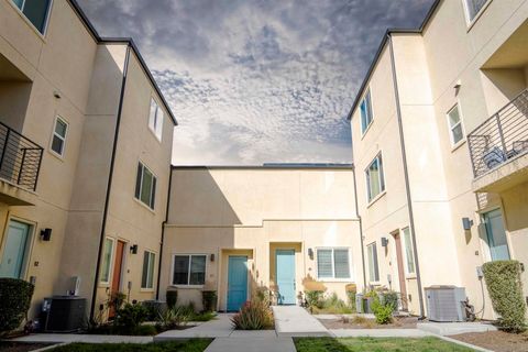 Photo of 5261 Beachfront Cove St Cv #Unit 41, San Diego, CA 92154 (MLS # 260002563SD)