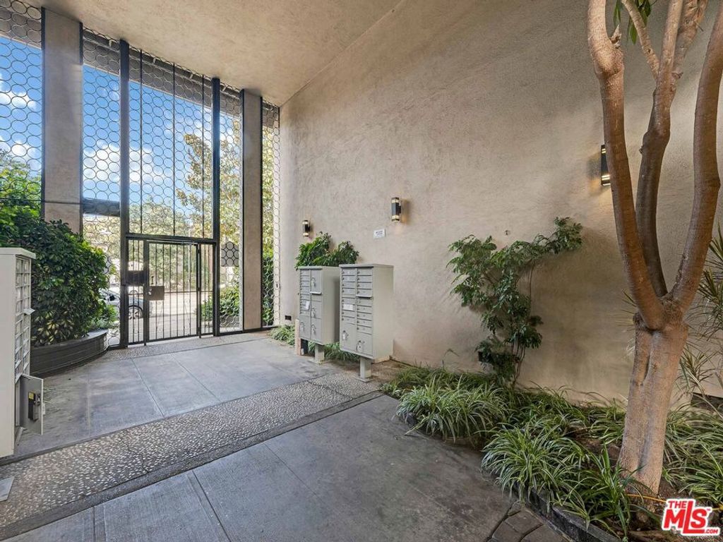 Photo of 3166 S Sepulveda Boulevard #22, Los Angeles, CA 90034 (MLS # 25606195)