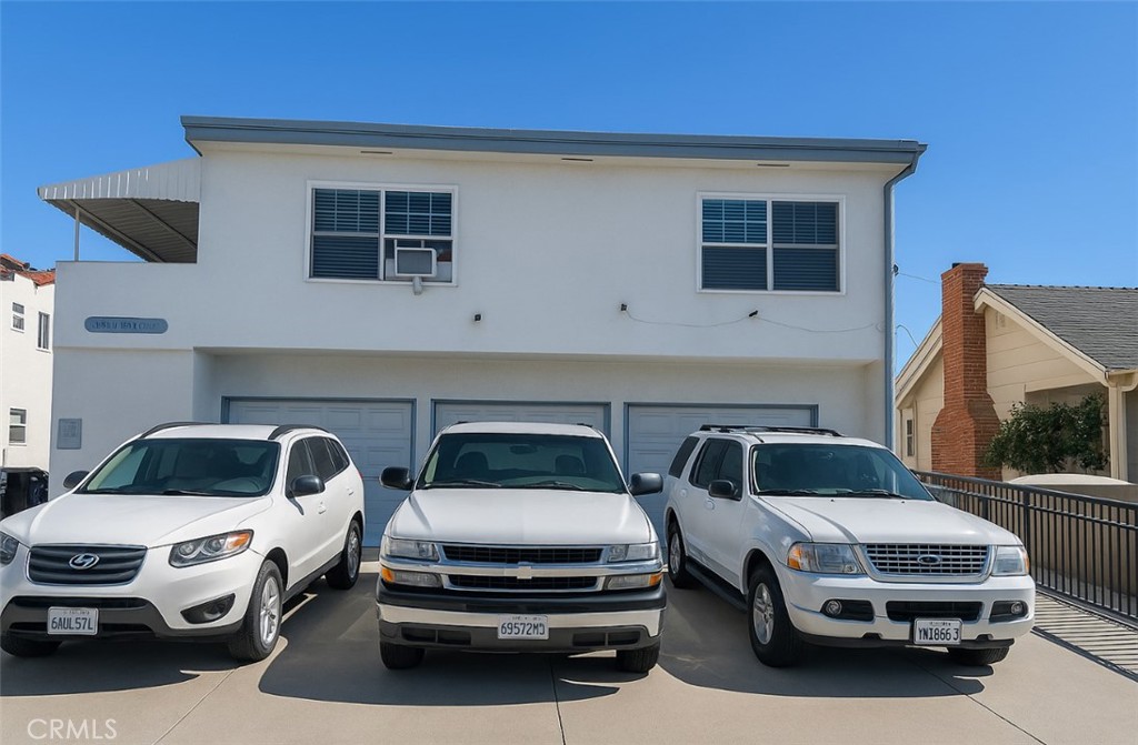 Fantastic Investment Opportunity in Prime Location! Welcome to this well-maintained Tri-Plex in Los Angeles, ideally situated near Cal State LA, shopping, dining, and easy freeway access. This property features three spacious 1 bedroom / 1 bathroom units, each with thoughtful layouts and desirable amenities. Unit 1 (Upstairs): Enjoy added privacy with no neighbors below and a private patio space, perfect for relaxing or sipping your morning coffee. This unit is perched above the garages, offering a unique lifestyle feel. Unit 2 (Middle): Centrally located in the building with convenient access. Unit 3 (Back): Tucked away at the rear for additional privacy—currently vacant, offering an excellent opportunity for owner-occupancy or market rent placement. Each unit comes with its own 1-car garage plus 1 driveway parking space, a rare and valuable feature in this area. Two units are currently rented, providing immediate income, while the vacant unit allows flexibility for investors or owner-users.
With room for updates and upgrades, this property has significant value-add potential through rent increases or cosmetic improvements. Whether you’re an experienced investor or looking for your first income property, this Tri-Plex is a smart addition to your portfolio.