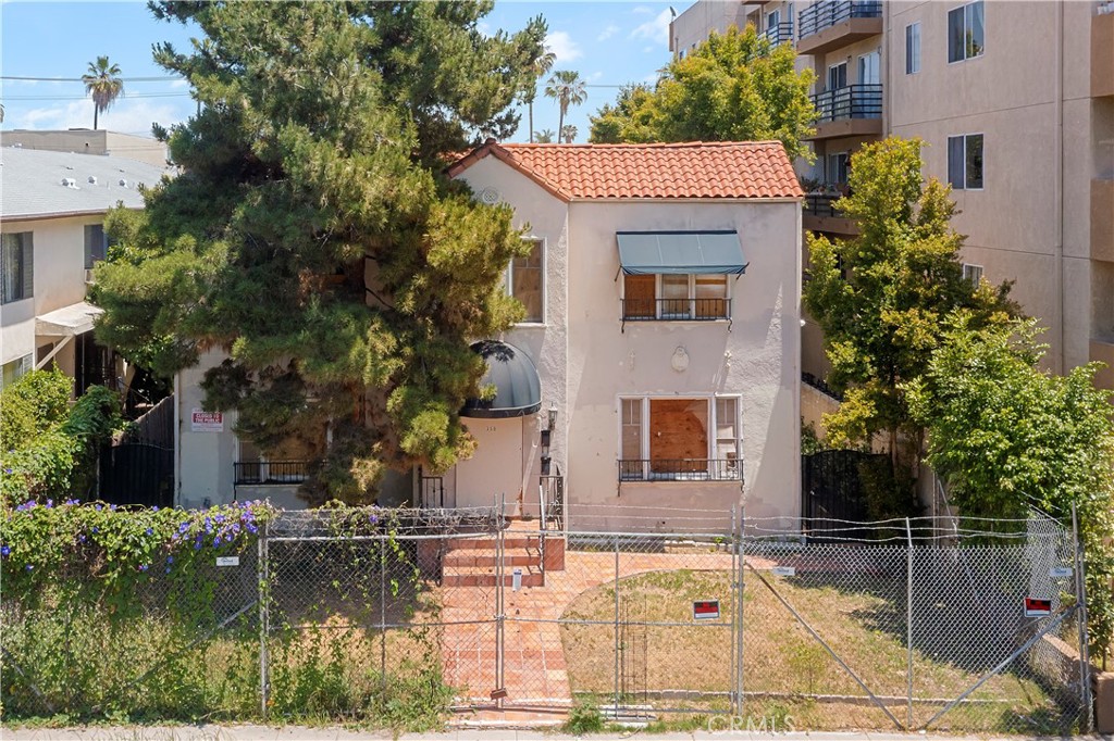 We proudly present 352 N Hayworth Ave—a prime redevelopment opportunity located in the heart of Beverly Grove, 90048. The property currently features a vacant, fire-damaged 4-unit building totaling 5,070 square feet and is ready for demolition. Sitting on a 7,526 square foot LAR4-zoned lot, the site benefits from an SB-8 exemption, as it has remained unoccupied for over five years. This exemption opens the door to a range of development options that do not require the replacement of low-income housing.
Almost RTI-approved plans include a 20-unit multifamily project consisting of 16 one-bedroom, one-bathroom units and 4 two-bedroom, two-bathroom units, with three designated as Extremely Low Income (ELI). There is flexibility to relocate the affordability covenant as long as the overall bedroom count remains equivalent.
Alternative development scenarios include a small lot subdivision supporting four to six single-family homes or a 100% affordable housing project under Executive Directive 1 (ED1). This site represents a rare blank canvas in one of Los Angeles' most sought-after neighborhoods, offering strong potential for a range of high-value development strategies. Reach out for Offering Memorandum & Feasibility Study.