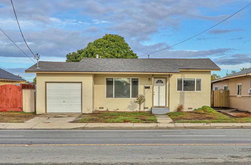 Calling all investors! Per the City of Salinas Planning Department, this lot may be eligible for Senate Bill 9. SB 9 facilitates the creation of up to four housing units in the lot area typically used for one single-family home. Buyer to confirm SB9 eligibility with the City. This refreshed 2-bedroom home combines charm, function, and potential. Recent updates include a new composition roof, interior and exterior paint, flooring, heating, appliances and window coverings. Turnkey and ready for your immediate comfort. The oversized 9,500 sq ft fenced lot offers endless possibilities.  The lot offers room to add on to the existing home, add ADU(s) for income potential, additional parking, a detached garage, or create RV space. A smart opportunity for those seeking a blend of value, function, and future possibility. Conveniently close to Highway 101, shopping, and local restaurants, this property delivers easy access to daily needs while leaving space to grow.