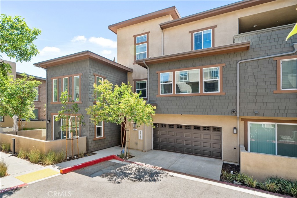 Welcome to 7387 Solstice Place in Rancho Cucamonga! This gorgeous condo is the largest plan, "Palazzo", in Day Creek Square and is walking distance to Victoria Gardens outdoor mall. When you walk in, you are greeted with tall ceilings and a nice open floor plan. The kitchen features a large island with granite countertops, stainless steel appliances, tile backsplash, custom island pendants, pantry and upgraded laminate flooring throughout. The main floor has a nice patio area perfect for barbecues and hosting family and friends. On the second level you have the primary bedroom, loft area, laundry closet, and secondary bedroom. The third level features another bedroom, exercise room/game room and a large private balcony. Centrally located near shopping, dining, and Rancho Cucamonga's first rooftop bar Durango Cocina and Rooftop!