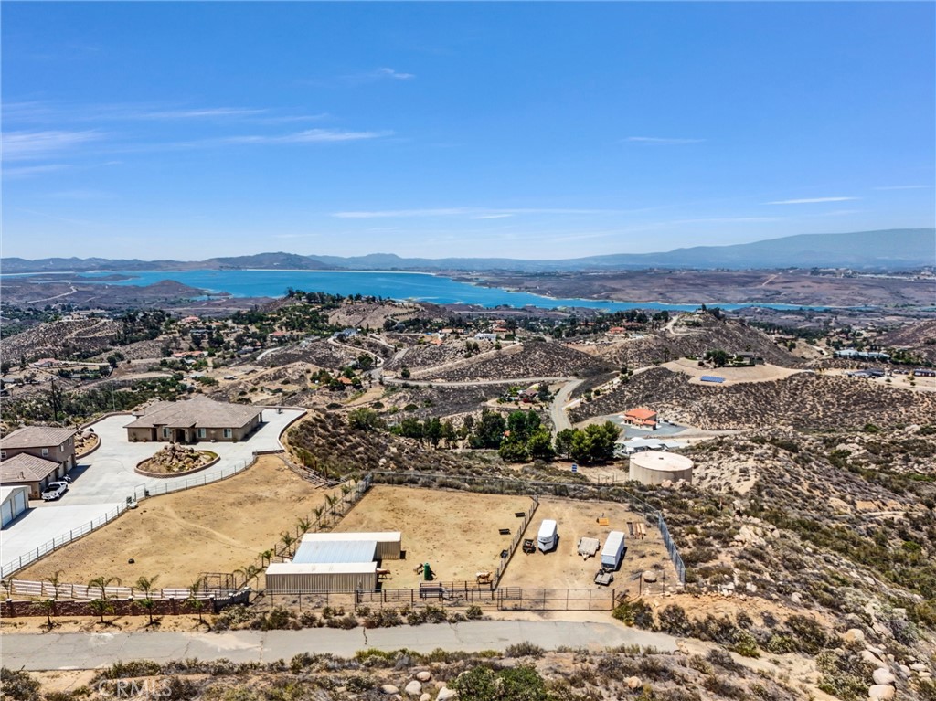 ALMOST 1/2 ACRE BUILDING PAD. This expansive 2.92-acre lot offers a rare opportunity to build your ideal retreat on a large, flat pad with breathtaking views of Lake Mathews. Nestled in a peaceful and scenic setting, the property blends natural beauty with endless potential.
Imagine waking up to tranquil surroundings and ending your day with vibrant sunsets. Whether you're envisioning a custom home or a private getaway, this lot provides the perfect canvas for your dreams.
Lake Mathews is a serene, unincorporated area in Riverside County, known for its rolling hills, scenic beauty, and open landscapes. The surrounding area offers privacy, a connection to nature, and a slower pace of life—while still providing convenient access to the I-15, 91, and 215 Freeways. You'll also enjoy being just a short drive away from a variety of restaurants, shopping centers, and everyday conveniences.
Don’t miss out on this incredible opportunity to call Lake Mathews home.