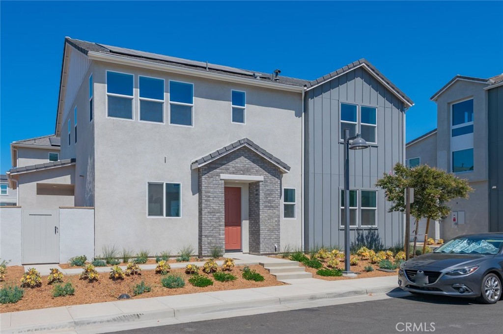 Brand-New 4-Bedroom Home in Great Park Neighborhoods Be the first to live in this stunning Duet-style home in Irvine’s highly desirable Great Park community! Enjoy the privacy of detached living, bright corner location, and easy guest parking. This modern two-story home features: 4 bedrooms, 3.5 bathrooms, ~2,542 sq. ft. Open-concept living with soaring ceilings and LED recessed lighting Chef-inspired kitchen with quartz countertops, stainless steel appliances, and walk-in pantry First-floor bedroom with en-suite bath – perfect for guests or multi generational living Upstairs loft and luxurious owner’s suite with walk-in closet and spa-style bathroom Private yard, covered patio, and attached garage Energy-efficient solar panels, wood flooring, and premium carpeting Community Perks: Pools, playgrounds, tennis & basketball courts, BBQ areas, and clubhouses — all just minutes from Irvine Spectrum, FivePoint Amphitheater, Great Park Ice Arena, and major freeways. live in style and comfort in one of Irvine’s most vibrant neighborhoods!