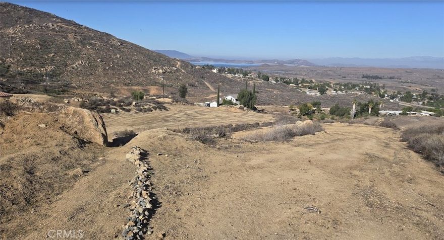 Looking for the perfect Southern California land to build your dream home or investment property? This 2.47-acre Perris parcel offers panoramic views of Lake Matthews, wide-open skies, and endless potential. Whether you envision a custom home, guest house, ADU, detached shop, or small farm, this R-A-5 zoned lot gives you the freedom and flexibility to bring your vision to life. Located just minutes from major freeways (I-215), shopping, restaurants, schools, and recreation, this property delivers both convenience and serenity. You’ll love the expansive layout, perfect for RV parking, boat storage, and outdoor living — all while enjoying privacy and natural beauty. Perris is one of Riverside County’s fastest-growing markets, making land ownership here a smart long-term investment. Enjoy peaceful agricultural surroundings, plenty of space to grow, and views that stretch for miles — all within reach of modern amenities. Don’t let this 2.47-acre opportunity slip away! The perfect spot for your next home, retreat, or income property is right here — and it won’t last long. Call today to explore the possibilities and make this land yours before it’s gone!