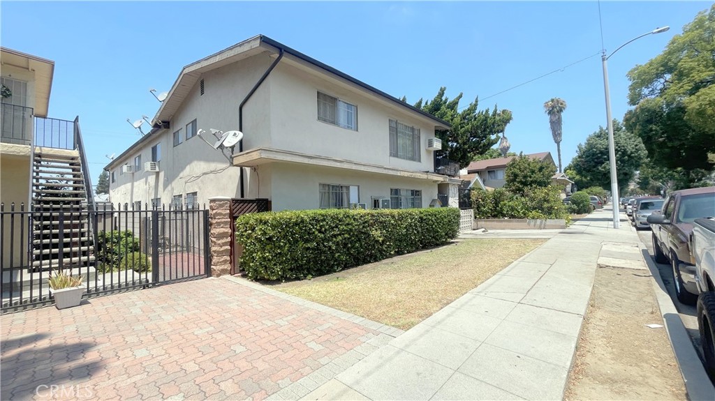 Welcome to 7233 Milton Avenue, a well-maintained multi-family asset nestled in the heart of Uptown Whittier. Built in 1958, this expansive property spans 5,682 square feet across a 7,002 square foot lot and features a unit mix consisting of seven 1-bedroom/1-bath units and one 2-bedroom/1-bath unit—offering a total of 9 bedrooms and 8 bathrooms. Currently operating with below-market rents, this income-producing property presents significant upside potential for investors seeking value-add opportunities in a high-demand rental market. Perfectly situated just minutes from the lively Uptown Whittier district, residents can enjoy walkable access to a diverse mix of: trendy cafés, boutique shops, local restaurants, weekly farmers markets, independent bookstores, and cultural landmarks. The neighborhood offers a vibrant, small-town feel with an urban edge—making it highly attractive to a broad tenant base.