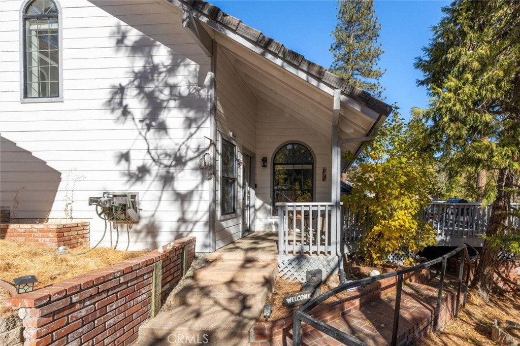 This is your chance to own an affordable property in beautiful Bass Lake! You can't beat this location, 10 minutes to the town of Oakhurst and only 25 minutes to the south gate of Yosemite National Park.Enjoy beautiful mountain views from the deck of this Ridgeline property. The wood burning fireplace in the family room will keep you cozy on cold winter nights. Also located on the main floor, are the dining room, 1/2 bathroom, kitchen with a large pantry, and a bonus room, which could be a bedroom or office.Upstairs, you will find the primary bedroom with bath, guest bedroom and bathroom as well as washer and dryer. Recently added are a new water heater, microwave and fan, wifi thermostat, wifi front door lock, laminate flooring in bathroom and leaf guard rain gutter filters with a transferable lifetime guarantee. Rentals limited to 30 days or more.