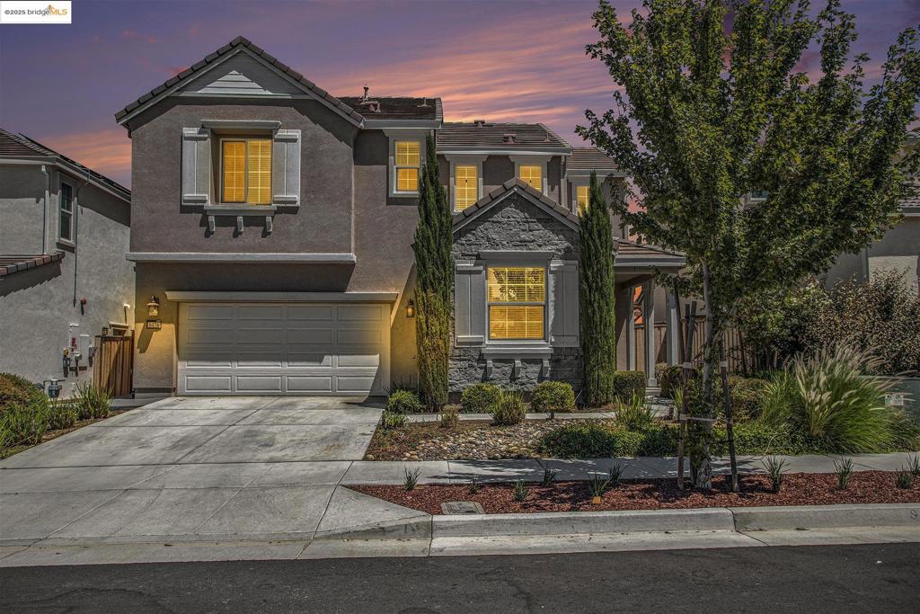 This is a stunning home in immaculate condition built by Meritage in 2019. Nestled on a tranquil trailside lot, home is a perfect blend of privacy and serenity and amazing views of city lights at clear views. The home has a full bedroom and bathroom downstairs. A chef's kitchen with plenty of cabinet space and eating areas. The massive family room can entertain plenty of guests! Great upgrades throughout the home including top of line appliances. The primary bedroom has double closest and the primary bathroom has a shower and a separate tub. The other two upstairs bathrooms are nicely sized with a very nice double vanity hallway bathroom.