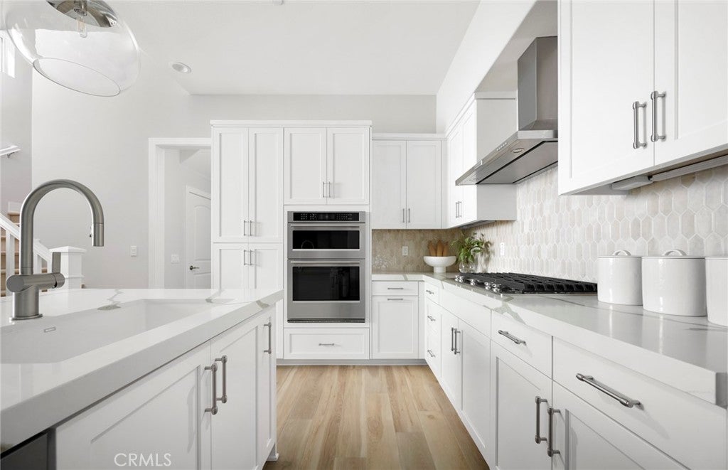 Photo of 105 Moody, Irvine, CA 92618 (MLS # IV26152307)