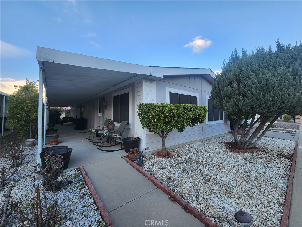 Fantastic investment opportunity in a wonderful 55+ community – PRICED TO SELL! This home boasts a spacious floor plan, thoughtfully designed toaccommodate your lifestyle and enhance your living experience. Bring your ideas, style, and tools and turn this into your dream! Step inside to discover newflooring that brings a fresh and modern touch throughout the entire home. The living and dining areas flow seamlessly, providing an ideal space forentertaining or enjoying quiet evenings at home. The abundance of natural light creates a warm and inviting atmosphere that you’ll love coming home to.The property features a covered carport, offering protection from the elements and easy access to your home. In addition, you'll appreciate the extra storageshed, perfect for helping you stay organized and decluttered, allowing you to fully enjoy your new space without any worries. Located within a friendly andengaging community, this home provides you not only a place to live, but a lifestyle filled with activities and connections. Whether you wish to take leisurelystrolls with neighbors or partake in community events, you will find numerous opportunities to make new friends. This home is priced to sell with aMOTIVATED SELLER! Don't miss out, schedule your private tour today!