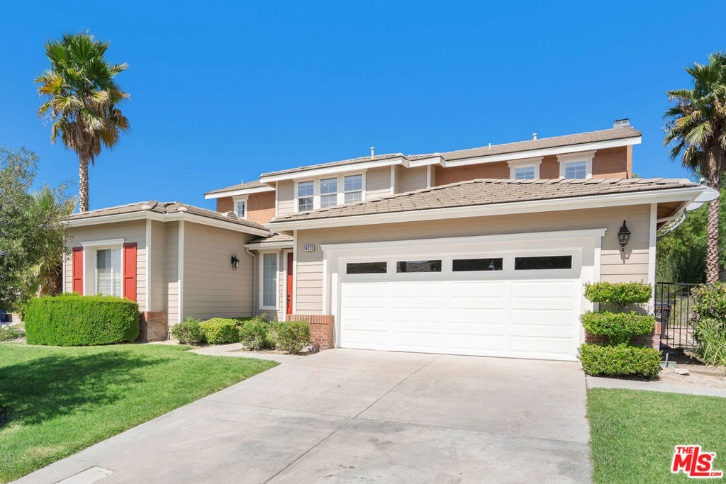 Welcome home to 14233 Yellowstone Lane, a 5 Bed, 3 Bath 3298 Sq Ft sun-filled, 11413 Sq Ft Lot retreat in Upper Stone Crest with views from nearly every window, where morning light, easy indoor-outdoor flow, and Santa Clarita's laid-back rhythm set the tone for every day. The open great room centers life around the kitchen for effortless entertaining and cozy movie nights, while a main-floor bedroom adds flexibility for guests or work-from-home, and a private primary bedroom suite upstairs offers a restful haven with generous closet space and spa-style bath. A quiet bedroom wing and a flexible bonus area adapt for an office, den, or gym. Step out to a low-maintenance yard made for al-fresco dinners and golden-hour sunsets. Beyond your door, enjoy miles of paseo paths, nearby parks and trailheads, weekend escapes to Castaic Lake, and everyday convenience to local cafes, markets, and nearby shopping and dining, plus quick access to I-5/CA-14 and Metrolink for streamlined commuting. Served by the Saugus Union and William S. Hart districts (buyer to verify). Practical perks include an attached 3-car garage and the presence and privacy that come with a corner lot. Experience the light, views, and ease, come see how naturally life falls into place here.