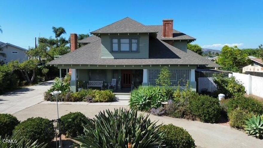 One of a Kind! This Charming 1912 Craftsman, offering 5 bedrooms 2 full and 2 half baths, 3487 sq ft of living space with a circular driveway, 3/car garage and extra work/craft room on a spacious 26,572 sq ft lot. Nestled behind a private gate this exceptional home combines classic character with generous living spaces.Inside you will find elegant custom crown molding, wainscoting, and wood beamed ceiling that highlight the homes craftsmanship. Many original doors and windows with beveled and stained glass. The open concept living and dining areas flow seamlessly complemented by built-in cabinetry with beautiful original wood details. Separate quest quarters, a beautiful glass block sunroom with tin ceiling and separate entrance from one of the covered porches.The beautifully remodeled kitchen has an eating area, and lots of pantry storage. Upstairs 3 spacious bedrooms, one with a balcony, offers comfort and flexibility for family, guests or home office needs. There is an assortment of fruit trees (including delicious avocados) and vegetation in the front and backyard. There may also be the potential for adding an ADU. This property provides a rare blend of privacy, space and timeless design, ideal for anyone seeking a classic Ventura residence with room to grow!