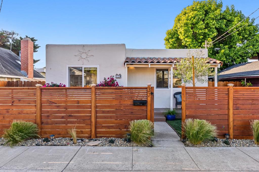 Just minutes from the beach and the scenic Monterey Rec Trail, this charming Spanish-style bungalow combines classic character with modern updates. Featuring 2 bedrooms, 1 bathroom, and an open floor plan, the home has been thoughtfully renovated to maximize comfort and functionality. The bright living area flows seamlessly into a remodeled kitchen with quartz counters, stainless steel appliances, and stylish tile accents. A beautifully updated bathroom and cozy bedrooms complete the interior. Outdoors, youll find a private fenced yard designed for entertaining with low-maintenance landscaping, and multiple sitting areas making it ideal for gatherings, dining al fresco, or relaxing in the sun. Located in the sun belt of Monterey, this home offers an unbeatable lifestyle. Walk or bike to the coast, enjoy dining nearby, or unwind in your own private retreat.