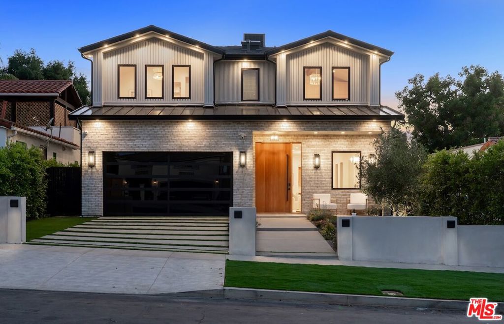 Step into refined modern luxury at this brand-new, custom-built estate located South of the Boulevard in the heart of Sherman Oaks. Featuring 6 bedrooms and 6.5 bathrooms, includes an attached ADU 1 bedroom and 1 bathroom. The main residence spans 3,885 square feet, with the ADU adding 725 square feet of additional living space. The home seamlessly blends organic textures with contemporary elegance, offering warm, inviting interiors and flawless design.The open-concept living area features custom built-ins, wide-plank oak flooring, a linear fireplace with a natural stone surround, and floor-to-ceiling sliding doors that flood the space with light and offer true indoor-outdoor flow. The gourmet kitchen is outfitted with sleek cabinetry, natural stone countertops, a statement waterfall island, and top-tier appliances designed for both function and form.Retreat to the primary suite with vaulted ceilings, a spa-like bath, and generous walk-in closet space. Each secondary bedroom is en-suite, offering privacy. A beautifully landscaped backyard with a pool and lounge area is ideal for entertaining.Located on a quiet, tree-lined street moments from Ventura Blvd's best schools, shops, dining, and cafes.