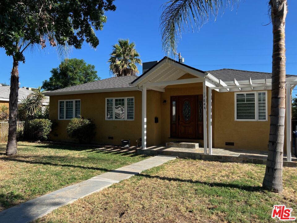 In the heart of Reseda sits this inviting 4-bedroom, 2-bathroom single-family home, offering both comfort and convenience. Boasting 1,541 sq ft of living space on a 5,879 sq ft lot, the home features a spacious layout perfect for everyday living. inside new flooring flows throughout, complemented by modern new appliances including a refrigerator, washer, and dryer.. This residence, tucked away on a quiet street, offers a peaceful escape while staying close to everything you need. From local shopping and public transportation to the popular Sepulveda Basin Recreation Area, everything is within easy reach ideal for weekend adventures and outdoor fun. A private oasis awaits in the backyard, complete with a lemon tree and plenty of space to relax or entertain. Whether you're enjoying a quiet evening or hosting guests, the outdoor area adds a unique charm to the property. Just minutes away, you'll find a wide variety of restaurants and entertainment options, making this location as vibrant as it is tranquil. this a must see.