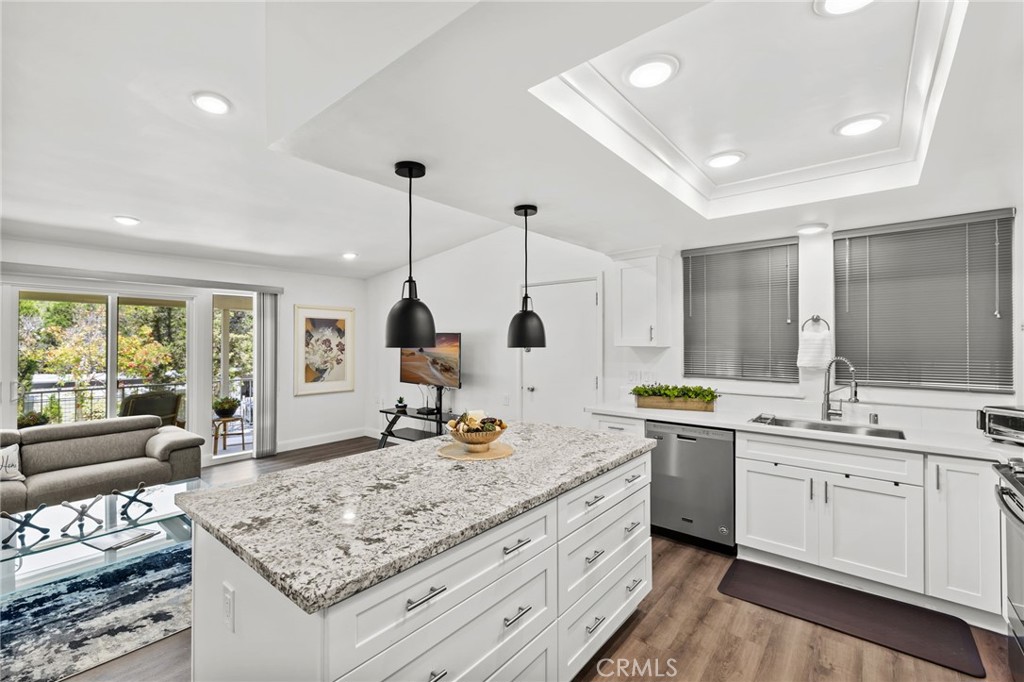 Experience resort-style living in this beautifully remodeled Casa Blanca model, available as a SHORT-TERM, FURNISHED rental from November 1 through April 30. Nestled in the vibrant 55+ community of Laguna Woods, this light-filled home offers a fabulous outlook and a serene setting. The spacious, open-concept floor plan showcases upgraded finishes throughout, a sleek modern kitchen, and stylishly appointed living spaces. Enjoy year-round comfort with ductless air conditioning, plus the convenience of an in-home washer and dryer. Offered fully furnished, this turnkey retreat is perfect for a seasonal escape or temporary stay. Laguna Woods residents enjoy access to world-class amenities, including 27 holes of championship golf, a 9-hole executive course, five swimming pools, tennis and pickleball courts, lawn bowling, equestrian facilities, fitness centers, over 250 clubs, and miles of walking and biking trails—all within a secure, gated community just minutes from the beach.