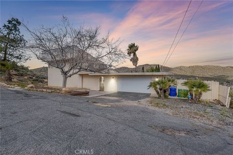Photo of 7731 Arrowhead Dr, Yucca Valley, CA 92284 (MLS # IV26018066)