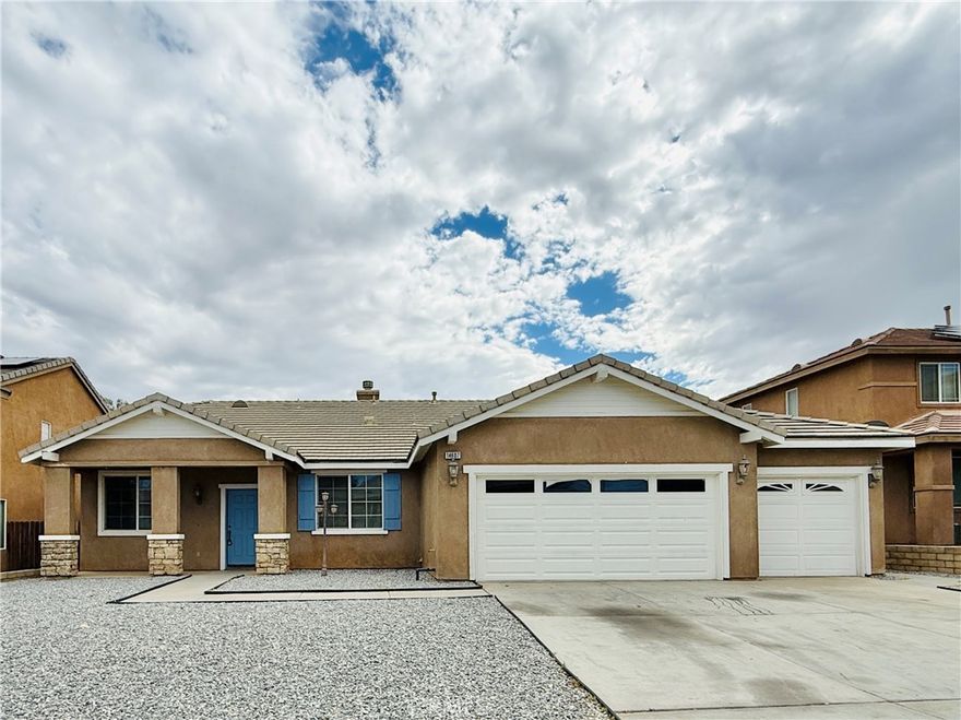Spacious 3-Bedroom Home with Bonus Room & 3-Car Garage in Victorville!

Welcome to your new home! This beautiful 3-bedroom, 2-bath residence offers plenty of room to spread out with both a large living room and family room, plus a bonus room perfect for an office, gym, or playroom.  The kitchen features ample cabinet space and a great layout for cooking and entertaining. Enjoy low-maintenance landscaping with a rockscaped front yard and a minimal-maintenance backyard — ideal for easy living.  Inside, you’ll find a convenient indoor laundry room and a spacious 3-car garage with room for vehicles, tools, and storage. The primary suite includes a walk-in closet, dual sinks, and a separate tub and shower for comfort and privacy.  Located in a quiet Victorville neighborhood, this home combines space, comfort, and practicality — just a hop skip and a jump from schools, retail shopping, places of worship and banking.