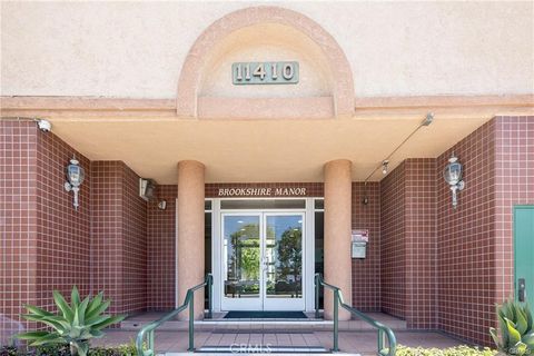 Photo of 11410 Brookshire Ave #117, Downey, CA 90241 (MLS # SR26037322)