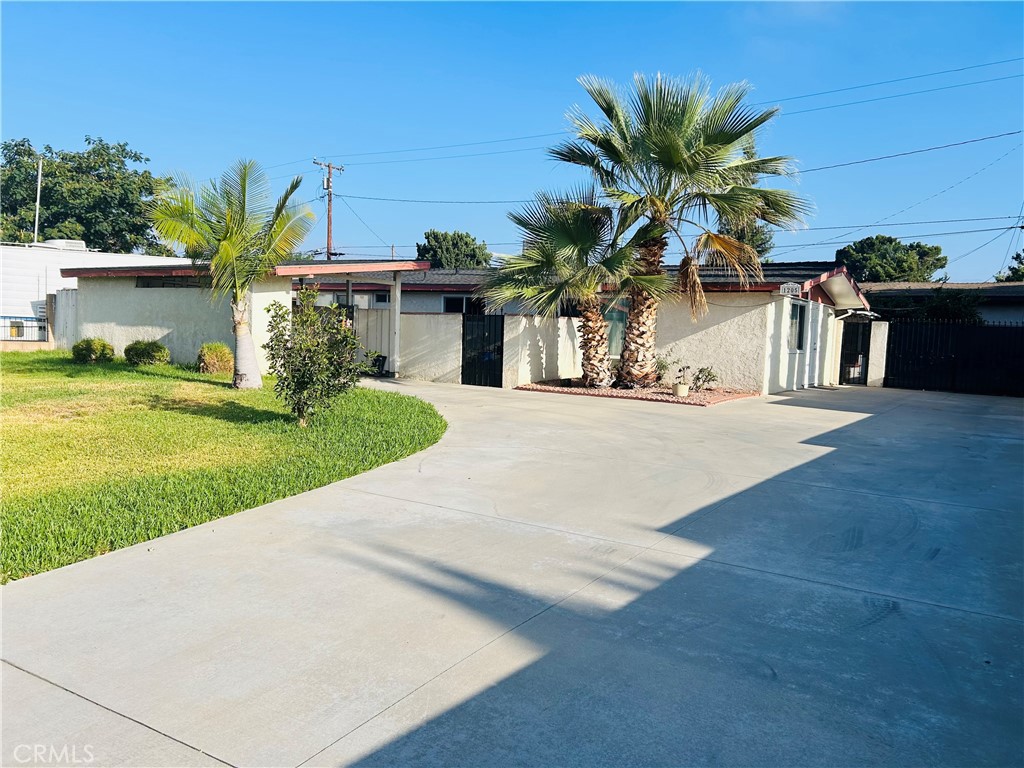 FRESH and relaxing new interior paint. Upgraded sliding patio doors provide a modern touch. This cozy 3 bedroom 1 bathroom home is located at a very convenient neighborhood nearby the 10 freeway and the West Covina Mall. Plenty of shops, restaurants, and retailers nearby. The home is set back on a large lot so there is plenty of green grass for curb appeal and the back yard is a nicely sized too. Warm & relaxing interior with plenty of natural light. Open floor plan, updated bathroom, and many other features !!!