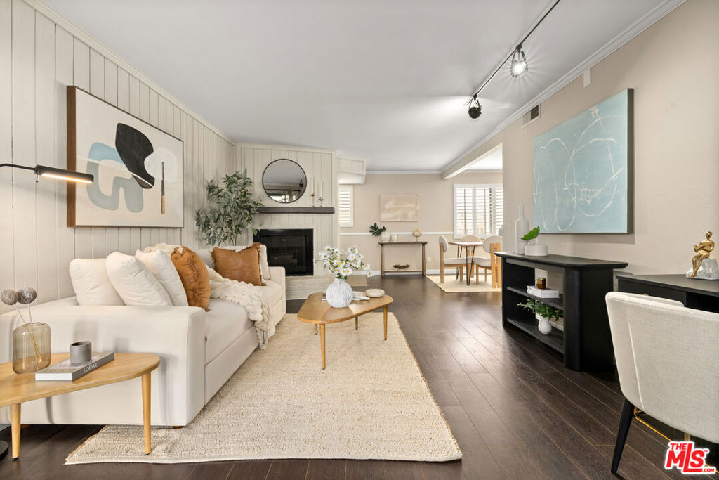 Nestled in the vibrant heart of Studio City, this residence offers a seamless blend of tranquility and amenities in a premier location. Situated in a boutique 10-unit building across from the Los Angeles River, you are just steps away from the iconic Sportsman Lodge featuring Erewhon, Equinox, Sugarfish and a curated mix of world-class shopping, dining, and more. Step inside the unit and discover a bright open layout with a formal living area, cozy fireplace and plantation shutters throughout. Take advantage of seamless indoor-outdoor living with a rare oversized private patio perfect for entertaining guests or relaxing. The kitchen is equipped with sleek granite countertops and stainless steel appliances. Retreat to a generous bedroom with a large walk-in closet. Additional features include in-unit laundry, two tandem parking spaces, additional storage and central AC. Take advantage of easy access to the Valleyheart Riverwalk directly across the street, a 1.5 mile paved pathway ideal for walking, running, biking and outdoor recreation. Close proximity to Ventura Blvd's shops, restaurants, and nightlife and easy access to the 101 freeway. Don't miss this opportunity to live in one of the most sought-after locations in the Valley!