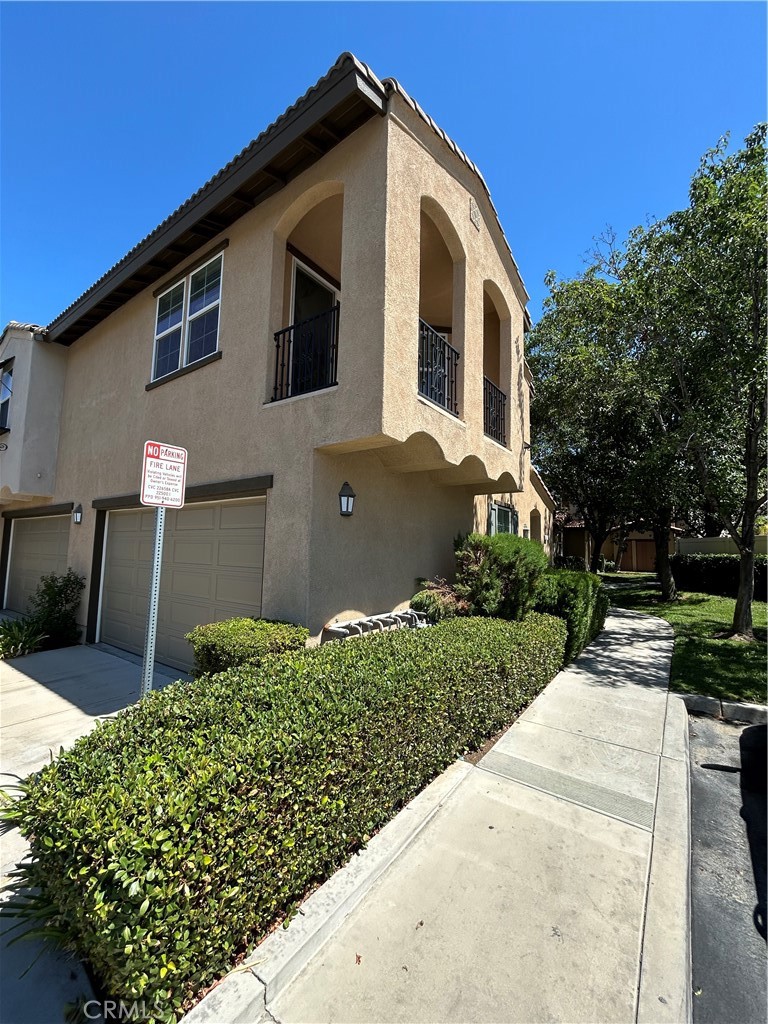 Spacious 2 story 2 bedrooms, 2 baths townhome that is located within the Ameila Square gated community. Beautiful Flooring neutrally painted throughout. Open kitchen with Granite Counters ,bar & Cherrywood cabinet in kitchen, both bedrooms are located upstairs indoor laundry room with washer and dryer, ceiling fans, fireplace, 2-car attached garage and a private patio!!! This town home is located in a gated community with pool & spa, tennis court and playground.