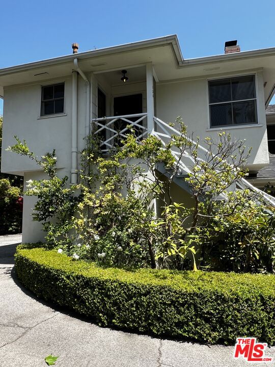 Feels like a home! A tranquil enclave tucked away in a beautiful Brentwood residential neighborhood, offers the laid-back charm of an idyllic small town within a cultural epicenter. This spacious 2 Bedroom, 1 Bathroom features hardwood floors, a fireplace in the Living Room and Laundry Room in the garage! Wonderful natural light throughout with garden views. Updates include recessed lighting, light fixtures, and remodeled kitchen with extra storage in a separate kitchen pantry. Garage Rental is paid separately for one hundred dollars ($100.00) per month. The location is excellent... you'll discover everything you love is conveniently close to home! With easy access to Brentwood Village, Westwood, UCLA, Beverly Hills, Century City, and the beaches of Santa Monica, Malibu and Venice, your home will be just minutes from world-class shopping, wonderful dining, and exciting recreation areas! Text or call today to schedule a tour. Listing/occupancy contingent on expiration of L.A. County Rent Restriction expiring July 31, 2025.