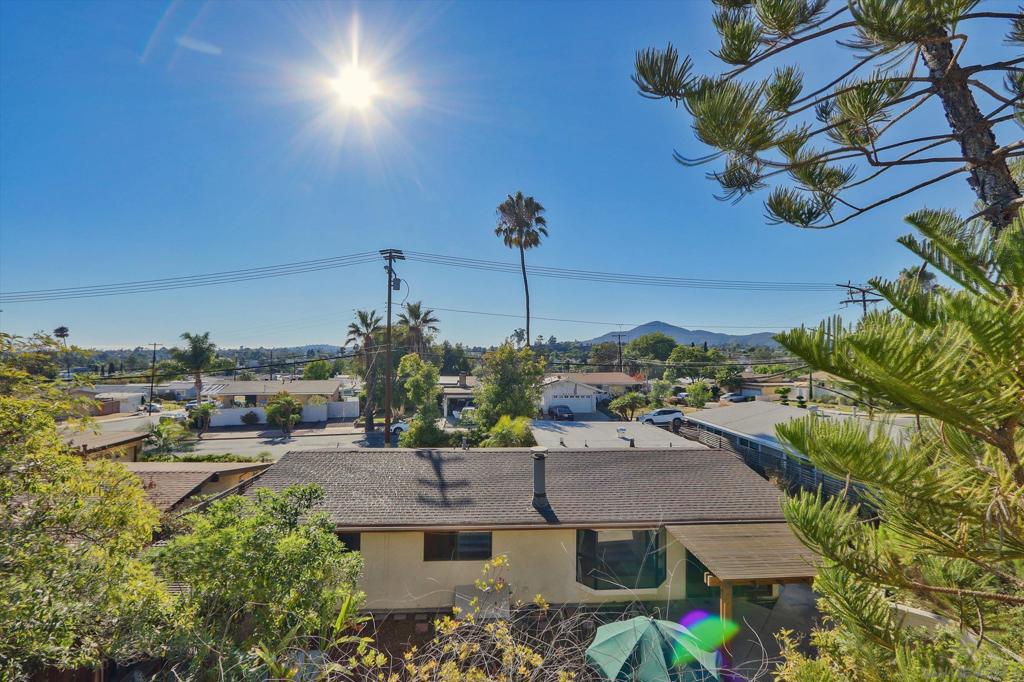 LIGHT AND BRIGHT HOME WESTERLY ORIENTATION-PERFECT STARTER HOME FOR A GROWING FAMILY-SPACIOUS LOT-FLOWING FLOORPAN-GENEROUS SIZE BEDROOMS-MASTERBEDROOM HAS SLIDING GLASS DOOR ACCESS TO AN ENCLOSED PATIO-HARDWOOD FLOORING THROUGHOUT-HIGH CEILINGS-NICELY LANDSCAPED BACKYARD-GREAT CITY VIEWS AS FAR AS THE EYES CAN SEE TO POINTLOMA FROM THE UPPER HILLSIDE OF YARD-BEAUTIFUL WOODEN PERGOLA FOR YOUR RELAXATION! LOCATED NEAR ALL MAJOR STOREFRONTS-COSTCO-GROSSMONT MALL-GROSSMONT HOSPITAL-SCHOOLS-LOCAL PARKS-EASY ACCESS TO FREEWAYS- CENTRALLY LOCATED-JUST A GEM OF A HOME! LIGHT AND BRIGHT HOME WESTERLY ORIENTATION-PERFECT STARTER HOME FOR A GROWING FAMILY-SPACIOUS LOT-FLOWING FLOORPAN-GENEROUS SIZE BEDROOMS-MASTERBEDROOM HAS SLIDING GLASS DOOR ACCESS TOAN ENCLOSED PATIO-HARDWOOD FLOORING THROUGHOUT-HIGH CEILINGS-NICELY LANDSCAPED BACKYARD-GREAT CITY VIEWS AS FAR AS THE EYES CAN SEE TO POINTLOMA FROM THE UPPER HILLSIDE OF YARD-BEAUTIFUL WOODEN PERGOLA FOR YOUR RELAXATION! LOCATED NEAR ALL MAJOR STOREFRONTS-COSTCO-GROSSMONT MALL-GROSSMONT HOSPITAL-SCHOOLS-LOCAL PARKS-EASY ACCESS TO FREEWAYS- CENTRALLY LOCATED-JUST A GEM OF A HOME!