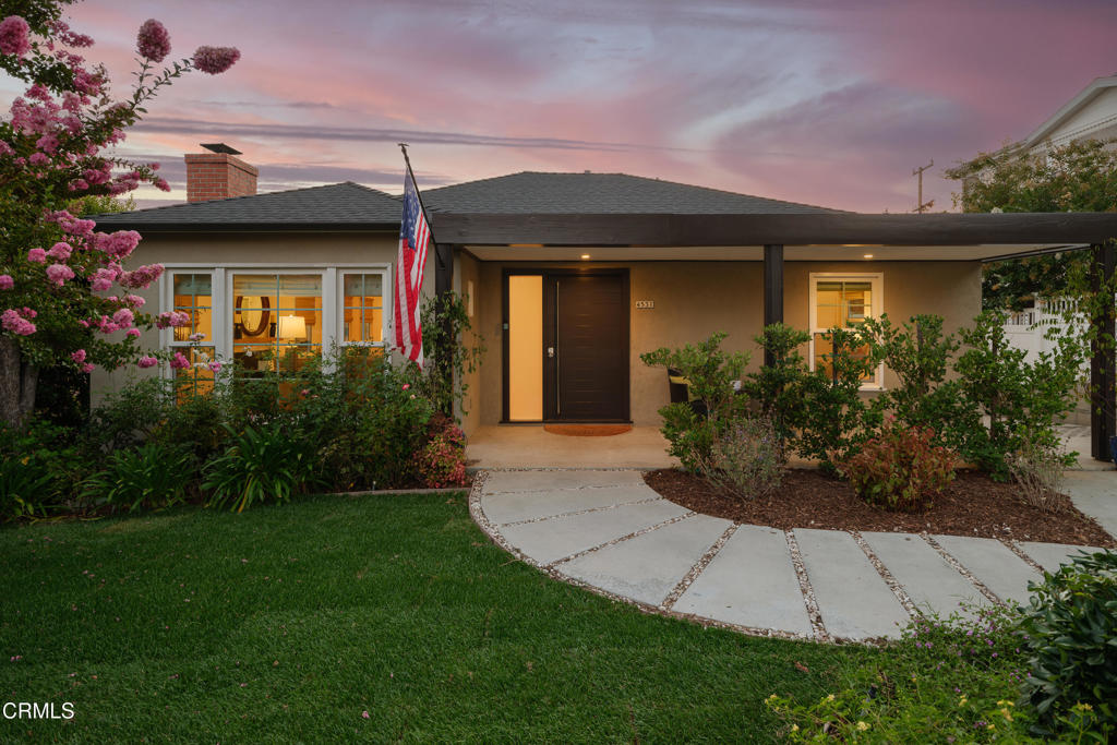 From the moment you arrive, this La Canada gem feels like home. A manicured front garden & charming covered porch set the tone for the warmth & elegance within. Inside, sunlight pours through the picture window in the living room, dancing across gleaming hardwood floors. Recessed lighting & a graceful wood-burning fireplace create a welcoming ambiance that flows effortlessly into the dining area & the heart of the home, a stunning modern kitchen. Here, a Caesarstone waterfall island invites conversation, casual dining & joyful gatherings. Stainless steel appliances, soft-close cabinetry & thoughtful touches like solar tube lighting make every detail a pleasure. Beyond the kitchen, a versatile den or home office with vaulted ceilings offers inspiration for work or relaxation. At the rear of the home, the primary suite becomes your private retreat, complete with vaulted ceilings, a designer ceiling fan & a spa-inspired ensuite with an oversized single sink vanity, soaking tub, glass-enclosed shower & a Toto bidet toilet. From the primary suite through the sliding glass door, discover the elevated rooftop deck to enjoy brilliant sunsets & even peek-a-boo ocean views on clear days. Below, a finished two-car garage & expansive bonus room create the perfect space for hobbies, games, or entertaining. At the front of the home, two serene bedrooms, both bright & spacious, are paired with an updated full bath & a stylish half bath for guests. The home features central air, a tankless water heater, a Ring alarm system & is located within an award-winning school district. This home blends modern luxury with timeless comfort in one of La Canada's most sought-after settings.