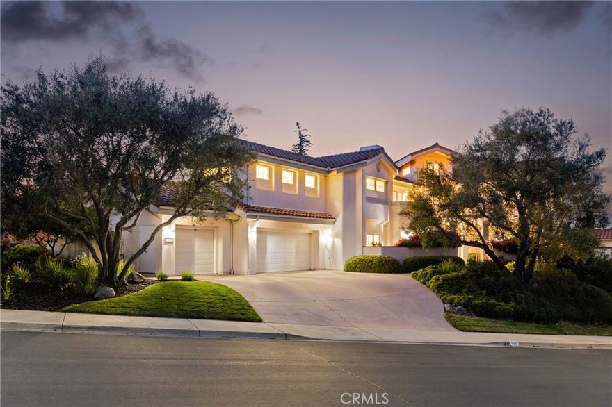 New and improved price! Welcome to 993 Las Palmas Way, a charming residence nestled within the gated San Luis Obispo Country Club Estates community, perfectly positioned on the 6th fairway of the prestigious SLOCC's private golf course. This thoughtfully crafted home offers 3,661 square feet, featuring four generously-sized bedrooms and three bathrooms.



From the moment you step inside, you're embraced by an elegant ambiance. The expansive floor plan unfolds with grace, highlighted by high ceilings that allow natural light to illuminate the rooms and built-in wood features. Each space flows harmoniously, ideal for intimate family gatherings or grand entertaining. The living room and family room, connected by a two-way gas fireplace, add to the home's inviting warmth. 



This property boasts breathtaking views of the golf course, nearby vineyards, and the surrounding mountains, visible from nearly every room. The living areas extend to charming outdoor spaces, perfect for savoring the tranquil beauty of your surroundings. Delight in a spacious dining room with a built-in bar, a chef's kitchen with granite countertops, a center island, breakfast nook, and built-in workspace, plus an upstairs built-in office space with balcony tailored for your work-from-home needs. The upstairs primary suite takes advantage of the sweeping views and features a private balcony, large walk-in closet, and grand en suite bathroom with jetted tub, walk-in shower, dual vanities with vanity, and toilet closet. 



Additional features include a three-car garage, a laundry room, and recently completed landscape refresh design plans. Enjoy proximity to the San Luis Obispo Country Club, Los Ranchos Elementary School, SLO Regional Airport, and nearby Edna Valley wineries, enhancing the allure of this exceptional home.