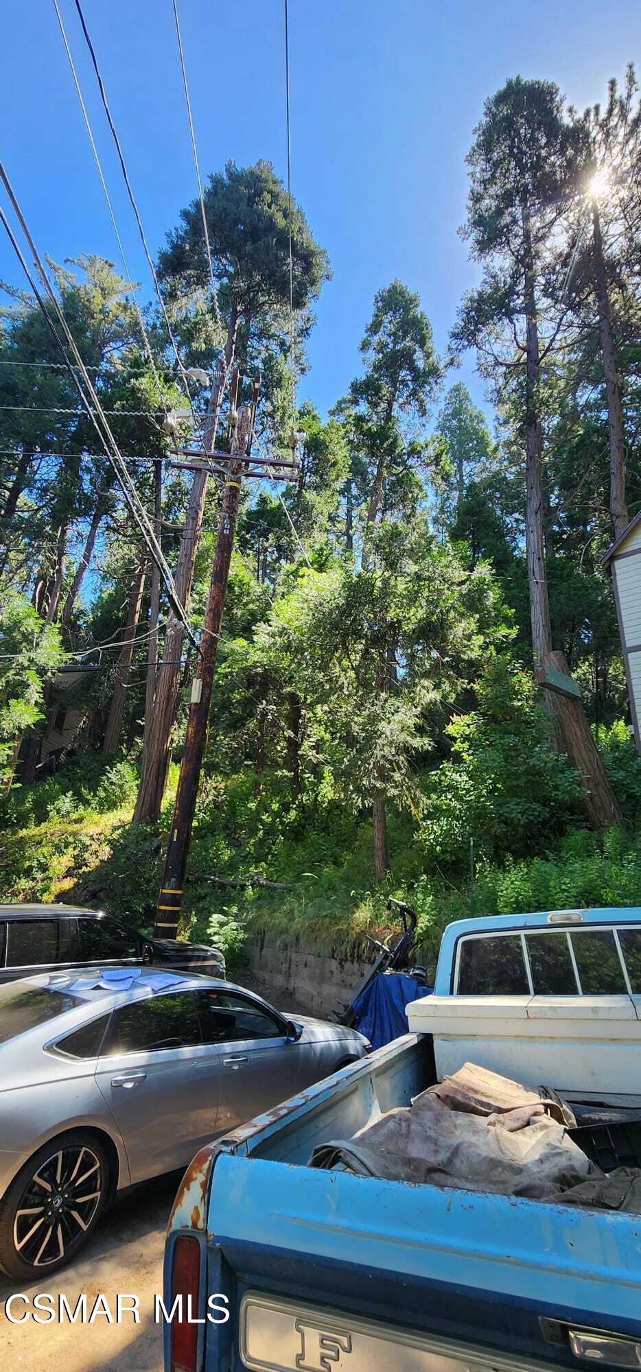 The land is between two houses. There is a high probability the builder of real estate can get access to utilities. Agents do not guarantee accuracy of information and buyers should satisfy themselves regarding permits and square footage etc.