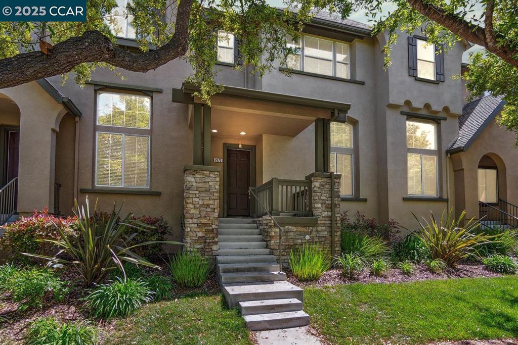 Centrally located townhome in Windemere neighborhood, a planned community in the heart of San Ramon’s Dougherty Valley. 1 mile to top-rated SRVUSD schools, walking trails, open space. Move-in ready 1979+/- light-filled SF. 3 bds. 2.5 bths. Inviting front porch entry. Hardwood floors. Wool carpet in bdrms. High ceilings. Recessed lights. Wood blinds. Contemporary style. Tree-lined street across from 2.4-acre Souyen Park, bocce ball ct, playgrd. Front porch entry. Spacious living rm, 2-story ceiling. Great rm. Dining area. Chef’s kitchen w/granite counters, oak cabinetry, island/bkfast bar. Stainless appls incld GE dishwasher, KitchenAid refrigerator, oven, microwave, 5-burner cooktop w/granite bksplsh. Family rm w/gas frpl, stone surround. Single door to rear balcony. Spacious landing for office nook. Primary suite w/ceiling fan, front-facing park & tree-top view windows, walk-in closet. En suite updated w/dual-sink vanity, shwr w/tile surround, sliding glass drs. 2 bdrms share bthrm w/single-sink vanity, tub/shwr combo. Staircase accesses 2-car garage, laundry rm. Nest thermostat. HVAC. 2 miles to Amador Rancho Community Cntr/Rancho San Ramon Park, spts fields, playgd, tennis cts.  Near shopping at The Plaza at Gale Ranch, San Ramon’s City Cntr, yr-round farmers market, freeways.
