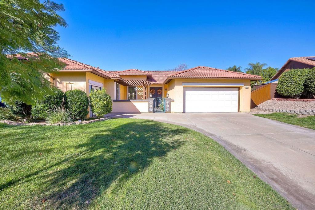 Come see this lovely 3-bedroom home in the serene setting of Rancho San Vicente. Beautiful 8' French doors lead outside to a large fully fenced backyard that is irrigated by well water. Enjoy your outdoor bbq area and take in the mountain views or relax under your covered patio. Come inside to a large kitchen with new range, double oven, microwave, dishwasher and sink. Ease into your main bedroom with additional French doors leading outside. Sink into your oversized tub. Additional upgrades include granite counter tops, large center island, and breakfast bar. New water softening system. A current office that can easily be converted into a 4th bedroom. Custom shades. Backyard she-shed for a fun escape. See supplement for more. Upgraded kitchen cabinets and beautiful built-in cabinets in the family room. New kitchen faucet and garbage disposal. 3rd garage is currently used as a storage area. Can be used for work, hobby, or bonus room.
