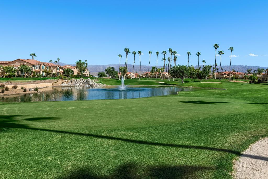 One bedroom, one bath lower-level condo with golf course, mountain and lake views. The condo has a stackable washer & dryer inside condo and a one car garage. One of the community pools is right across the street. Palm Royale is a gated community within walking distance to Indian Wells Tennis Gardens. Unlimited golf is included in the HOA dues on the Ted Robinson designed par-3 golf course. This is the Valley's Premier Short Course! Clubhouse & Pro Shop. Minutes from destination golf, dining & shopping. Community amenities include 6 pools & spas, lighted pickle ball and tennis courts and Helix Disc Golf. HOA fees also include basic cable, and internet, landscape maintenance, & trash service.