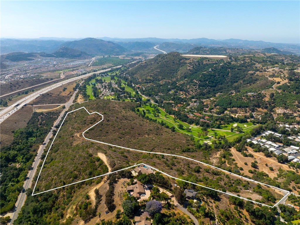 Prime 23.22 acre land opportunity in Fallbrook CA with incredible views of the surrounding mountains and valleys overlooking the Pala Mesa Golf Resort. Pre-development engineering and preliminary filings with the county for a proposed 6 LARGE estate style homesites with a large portion of the pre-development and environmental reports complete and included as a massive bonus. This property offers multiple directions of opportunity from a large single estate, multi-property land development and building, investment, and potential private agricultural vineyard or grove. Throughout the property in conjunction with the preliminary proposed subdivision are 6 rough individual pads ready for future grading, which offer incredible views and vast separation for potential neighboring development. Prime location near the 15 fwy and HWY 76 intersect with Temecula to the North, San Diego to the South, Oceanside to the West, and Pala to the East.