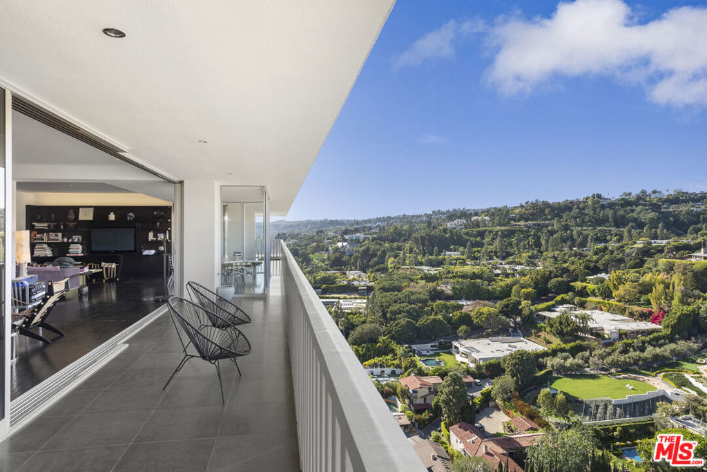 Located on the 23rd floor within the exclusive Sierra Towers, this sprawling corner double unit features the most stunning views of the Hollywood Hills, city, ocean, and Santa Monica Mountains. The double doors lead to a sweeping open floor plan directly to the living room and flow seamlessly to the dining area, family room, and kitchen. An oversized terrace that spans the entire unit offers the perfect indoor-outdoor setting and is accessible by all rooms. The extraordinary primary suite includes an open and bright bathroom with a soaking tub and generous walk-in closet. Additionally, the unit features a guest bedroom suite, walk-in pantry, and separate laundry room. This is a full-service building with 24-hour valet parking and security, luxurious pool and spa areas, a well-equipped gym, sauna, and a conference room. Conveniently located between Beverly Hills and the Sunset Strip, within a short walk to SOHO House and LAVO Ristorante.