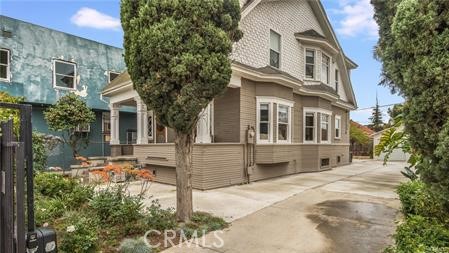 Stunning, historic, commercial office in the heart of thriving Downtown Santa Ana. Your clients and guests will be impressed visiting your business while enjoying the old world craftsmanship and architectural details including gorgeous woodwork, an impressive double staircase, period-style windows, high ceilings, and hardwood floors. While the building has maintained its grandeur, it has updated modern features which include recessed lighting, pristine bathrooms, an office kitchen with ample quartz counters and stainless-steel appliances. Your guests and clients will be greeted by an inviting reception area, a conference room with an abundance of natural light and three, large offices on the second floor. The property boasts an automated front gate for security and plenty of parking. The property is landscaped with fruit trees and low-maintenance plants, perfect for enjoying lunch or an afternoon break. The property is also located within walking distance to all of the DTSA coffee shops and restaurants, as well as the federal building, courthouse and county offices. Do not miss this exquisite, turn-key opportunity. Be part of this exciting opportunity before it is too late! The immediate area is in the midst of rapid redevelopment, including plans to transform the nearby First American campus and Northgate Market into market-rate residential units – not to mention the OC Street Car already under construction.