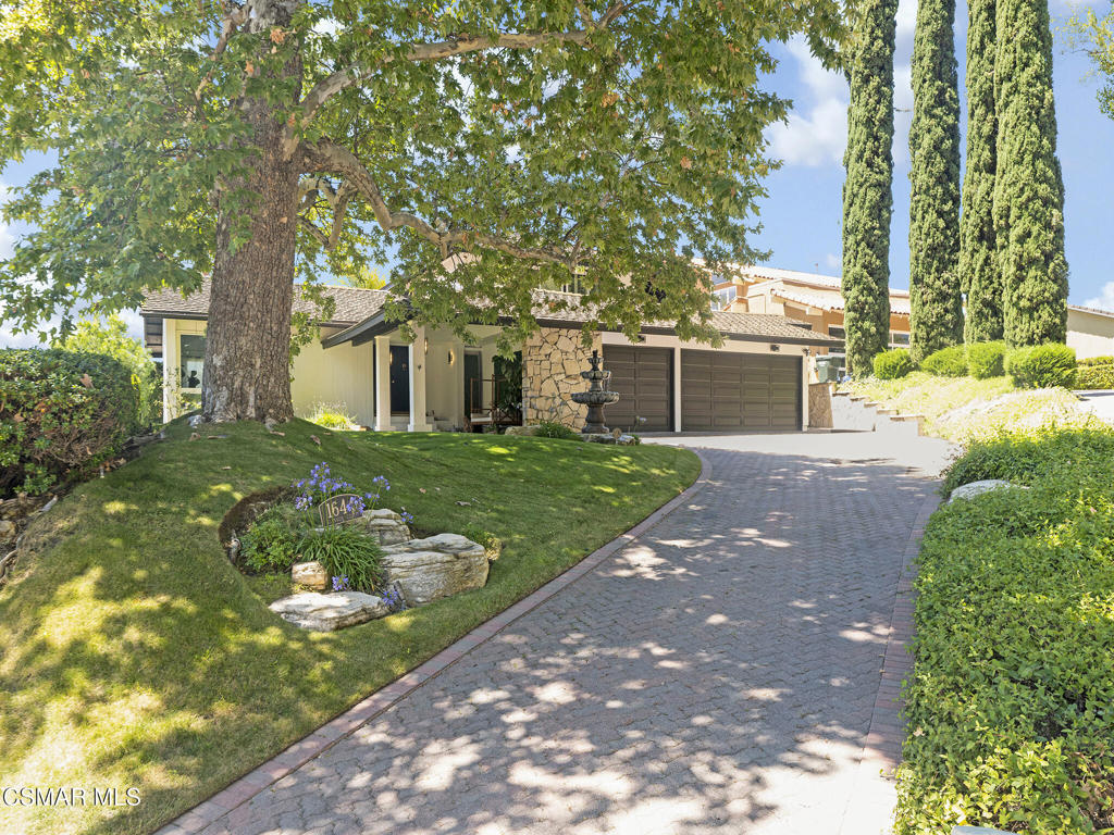 Stunning and Spacious Westlake Dream Home - Fully Furnished LeaseWelcome to this beautifully furnished two-story residence located in the heart of Westlake Village. Featuring 3 full bathrooms and a thoughtfully designed floor plan, this light-filled home blends comfort, functionality, and modern amenities.Enter through elegant double doors into a bright foyer and a step-down living room with soaring vaulted ceilings. The formal dining room sits just above, leading into a fully upgraded kitchen with a large center island and a cased opening offering views into the inviting family room. A sliding glass door connects the kitchen to the private backyard oasis--complete with a sparkling pool, spa, firepit, and built-in BBQ--ideal for entertaining or relaxing under the stars.Downstairs includes a charming bedroom with built-in closet and storage, conveniently located next to a full bath. Upstairs, the spacious primary suite boasts built-in cabinetry and closets, along with serene treetop and mountain views. Two additional upstairs bedrooms complete the layout.The home features a long pavered driveway, beautifully landscaped grounds, a tranquil fountain, and a 3-car garage with an additional large space that could serve as a tandem 2-car area.Gardener, trash service, and Wi-Fi are included in the lease for your convenience.Enjoy proximity to award-winning schools, parks, shopping, dining, and everything Westlake Village has to offer. Don't miss this rare opportunity to lease a fully furnished, move-in-ready home in one of the area's most desirable communities!