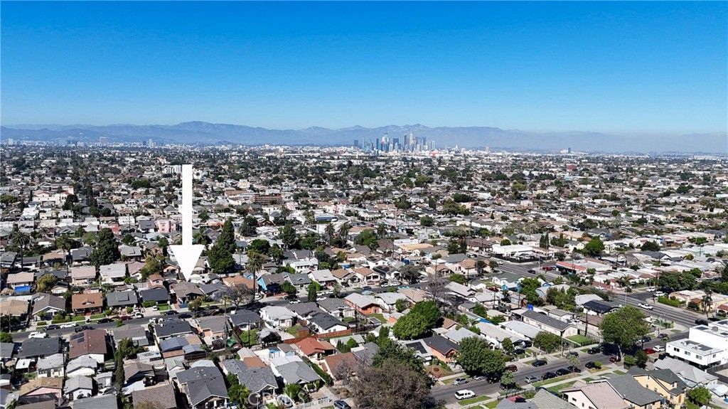 Photo of 1453 W 56th St, Los Angeles, CA 90062 (MLS # CV26063670)