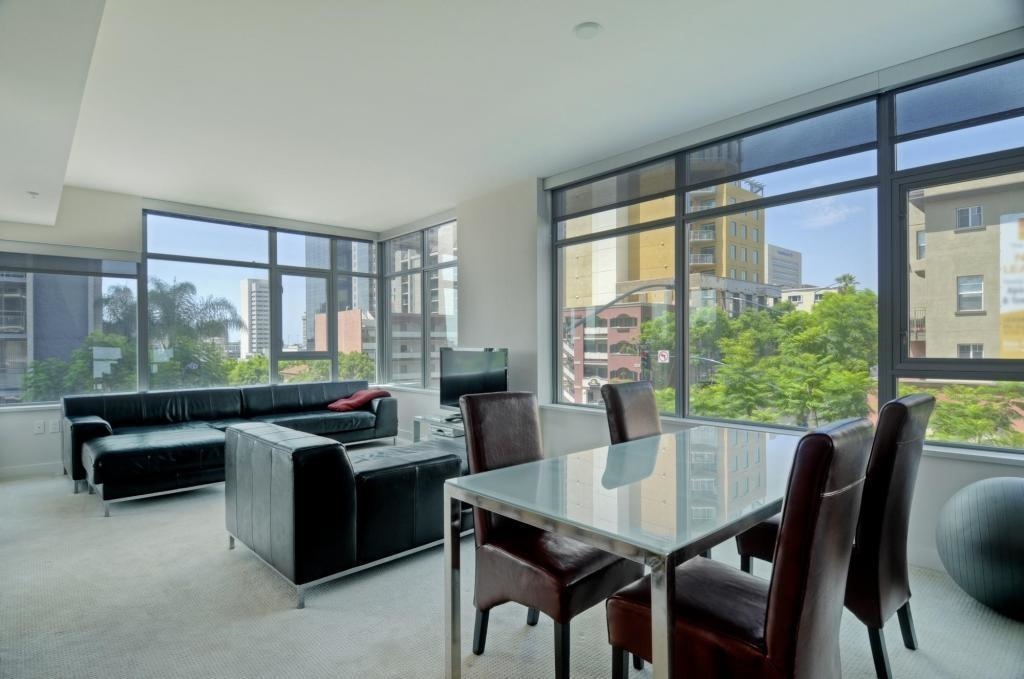 Nestled in heart of Cortez Hill, this bright, beautiful two-bedroom Aria corner unit has an open floor spacious floor plan with plenty of natural light from the floor to ceiling windows. The interior is contemporary urban with neutral colors throughout and quartz counter tops with stainless steel appliances. Washer/dryer in unit. Two parking spaces. Aria features a pool, spa, BBQ area, fitness center and much more. Available March 17th. Neighborhoods: Cortez Hill