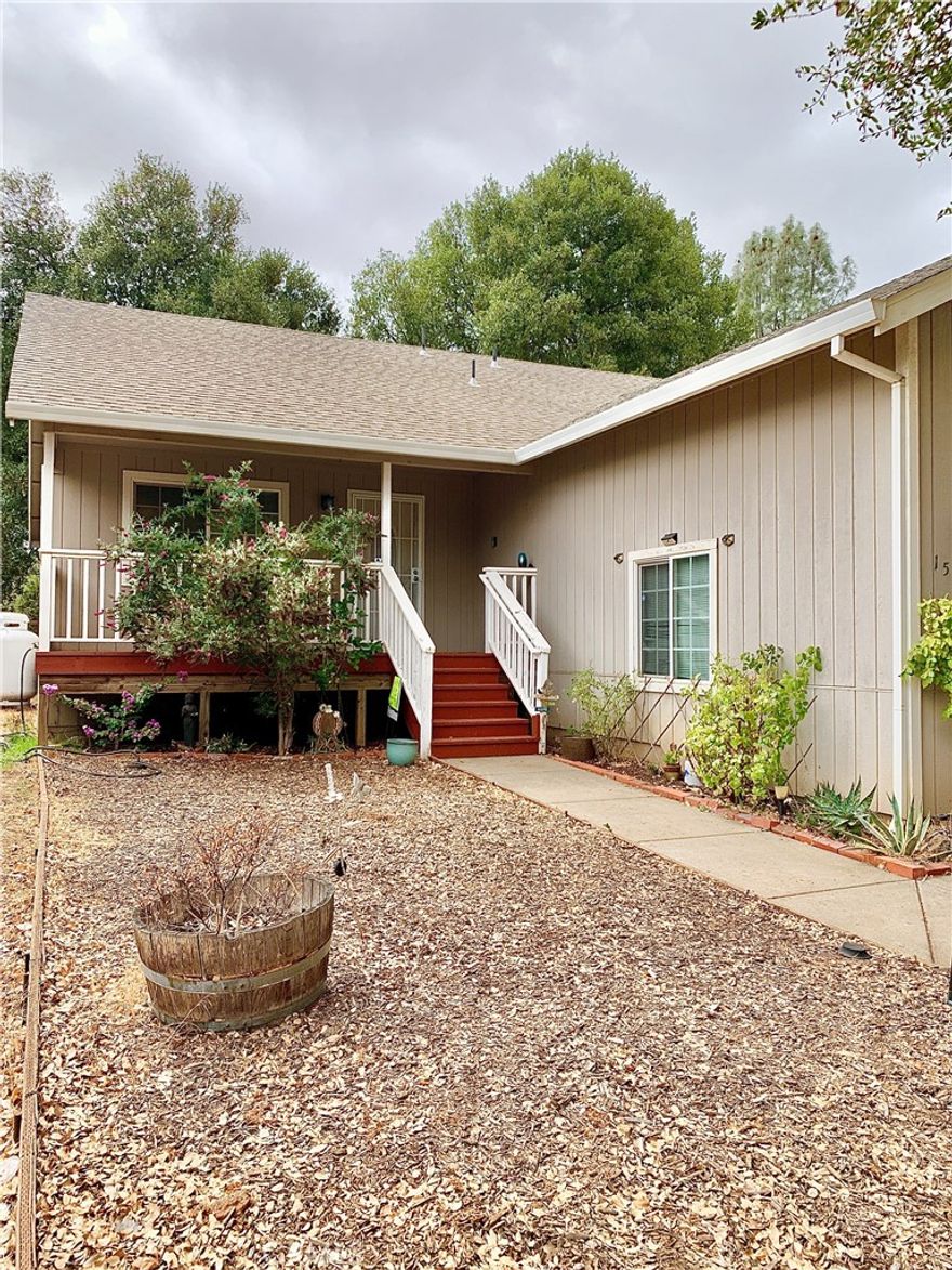 Very Lovely 3 Bedroom 2 bath home built in 2007, located in Clearlake. This home features New Flooring in living room and hallway that leads to the spacious main ensuite with vaulted ceiling and double door access. The dining room and kitchen have tiled floors, granite countertops, propane stove, dishwasher and a sliding door out to the deck with a fenced backyard. The vaulted ceiling in living room gives a light and airy feel with a view out of the large front window to the covered porch. An on demand water heater; air conditioning; and heating; and an attached 2 car garage, are just some of the other features to this home. This home is located near shopping, coffee shops, the hospital and more.