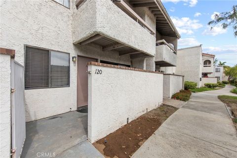 Photo of 25007 Peachland Avenue #120, Newhall, CA 91321 (MLS # SR26058654)